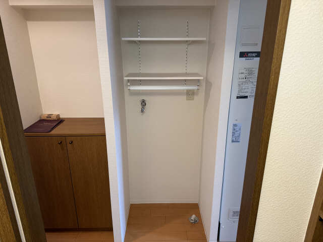 洗濯機上部可動棚