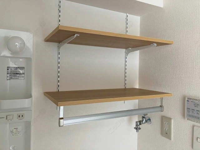 洗濯機上部可動棚