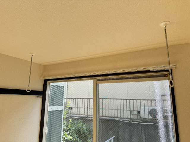 室内物干し竿かけ