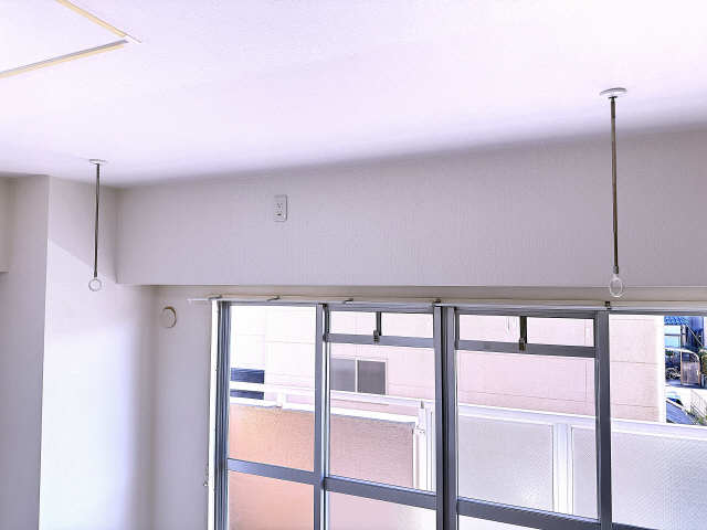 室内物干し竿かけ