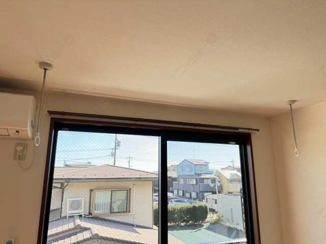 室内物干し竿かけ