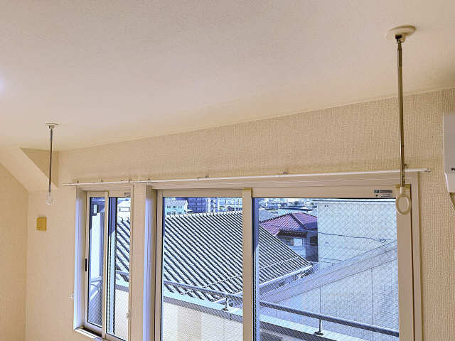 室内物干し竿かけ