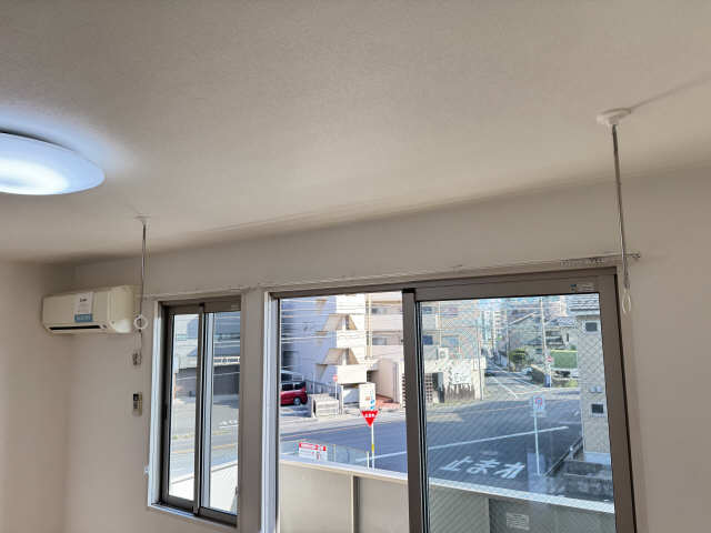 室内物干し竿かけ