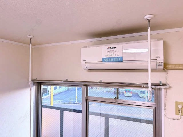  室内物干し竿かけ