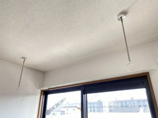 室内物干し竿かけ