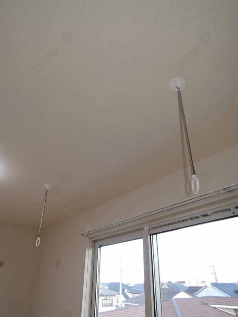 室内物干し竿かけ