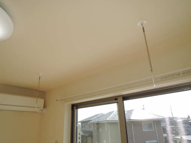 室内物干し竿かけ