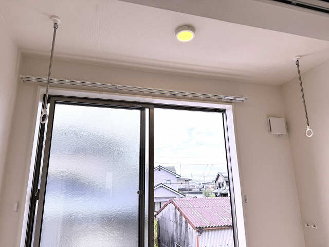 室内物干し竿かけ