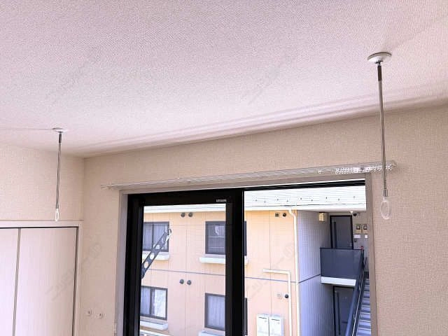 室内物干し竿かけ