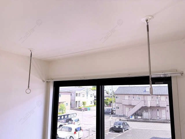 室内物干し竿かけ