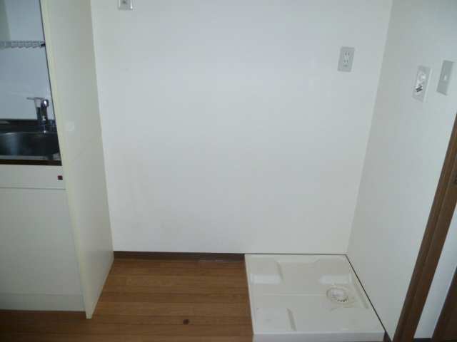 レジデンス司Ⅱ 1階 室内洗濯機置場