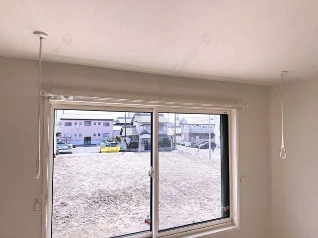 室内物干し竿かけ