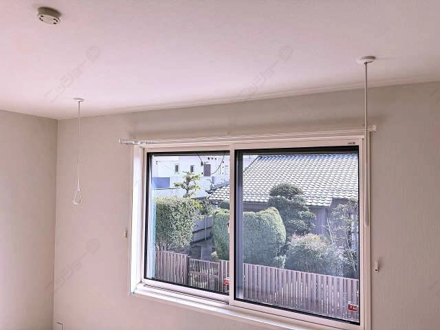 室内物干し竿かけ