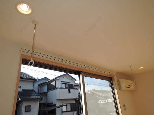 室内物干し竿かけ