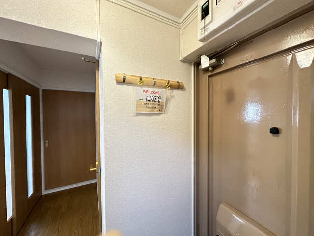 玄関コート掛け