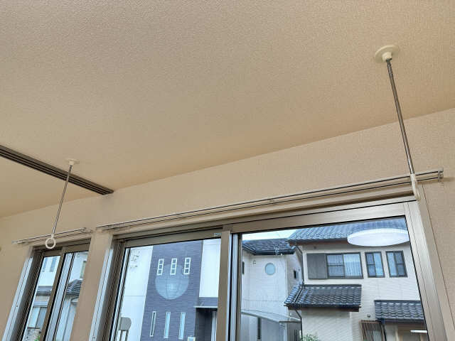 室内物干し竿かけ