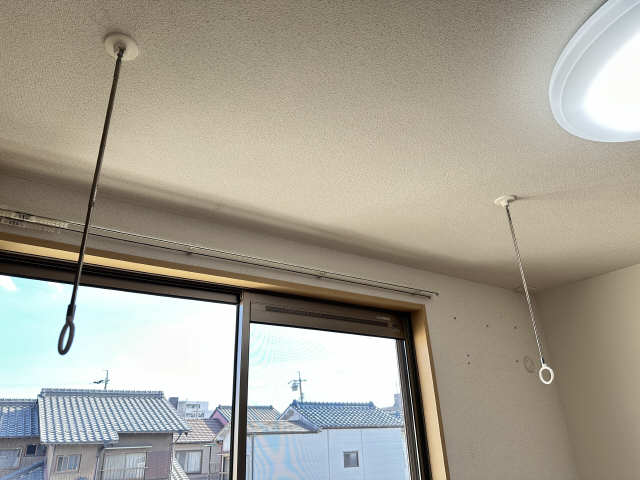 室内物干し竿かけ