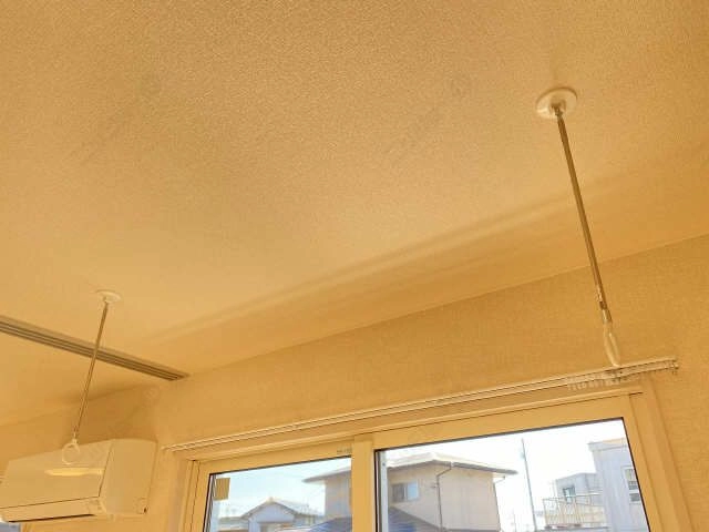 室内物干し竿かけ
