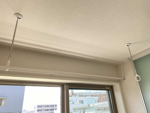 室内物干し竿かけ