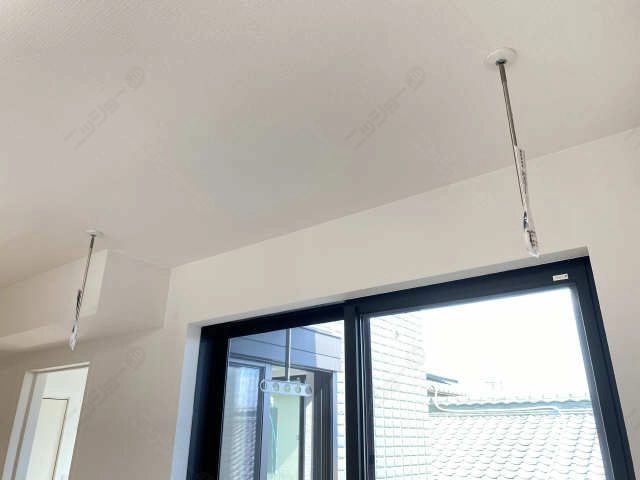 室内物干し竿かけ