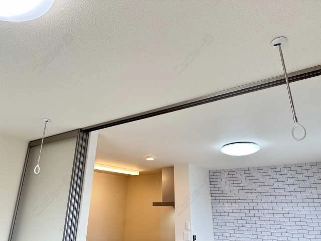 室内物干し竿かけ